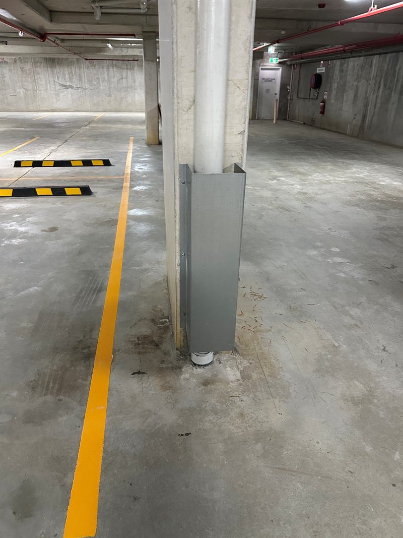 Pipe guard on a column