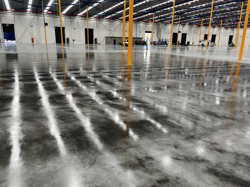 Warehouse floor in Kurnell sealed to a mirror-like gloss