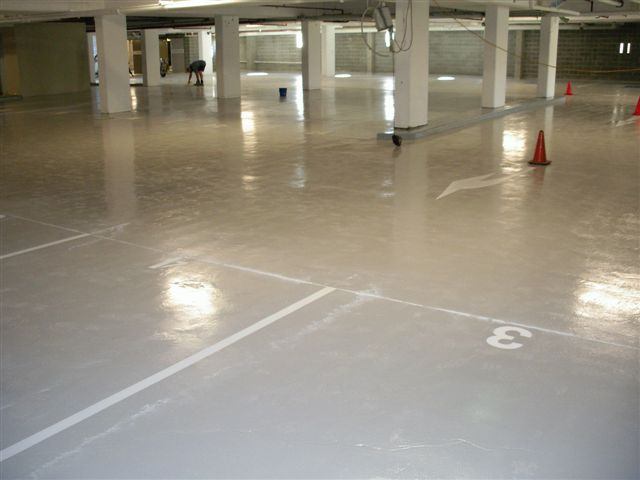Glossy N35 light grey water-based epoxy floor with bay markings