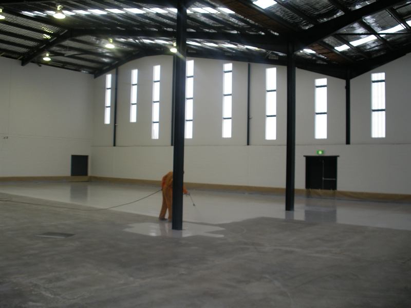 Coating progressing across the slab