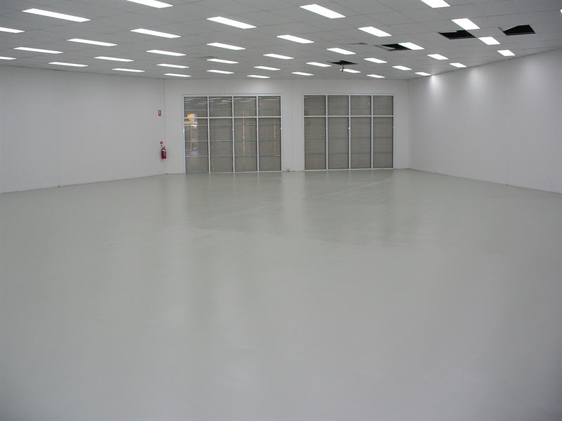 Showroom floor after: smooth, bright epoxy finish